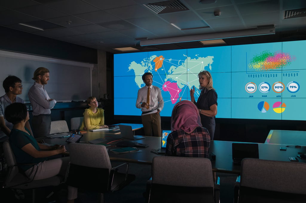 Team discussing global PCI DSS compliance strategy with interactive map