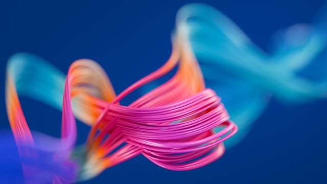 Formas abstratas coloridas em movimento sobre fundo azul